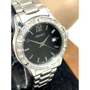 Seiko Women's Watch SUR719 Quartz Black Dial Date Silver Stainless Steel…